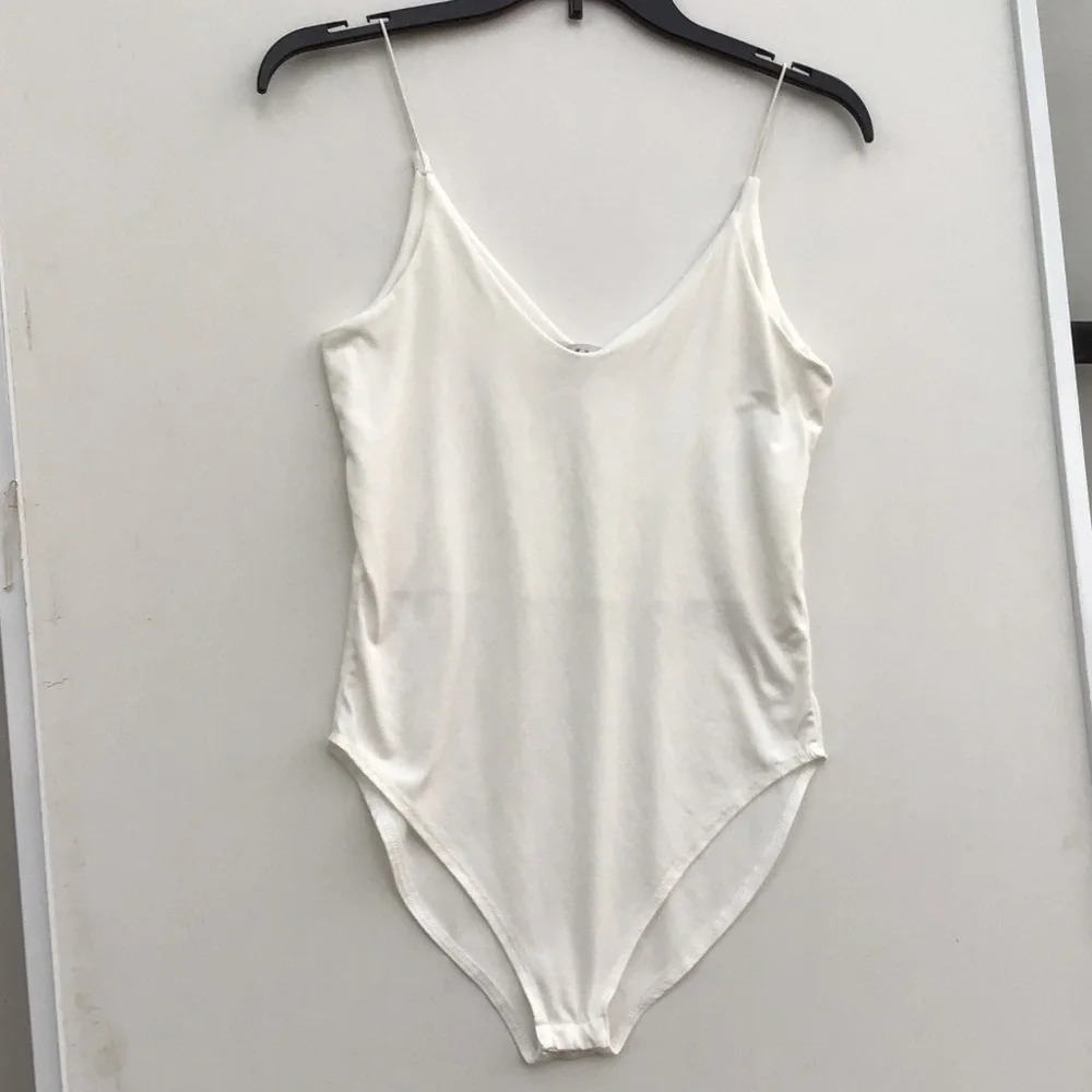 Gaze solid and bright white body suit one piece. Size Medium.  C190​​​​​​ - Picture 2 of 6